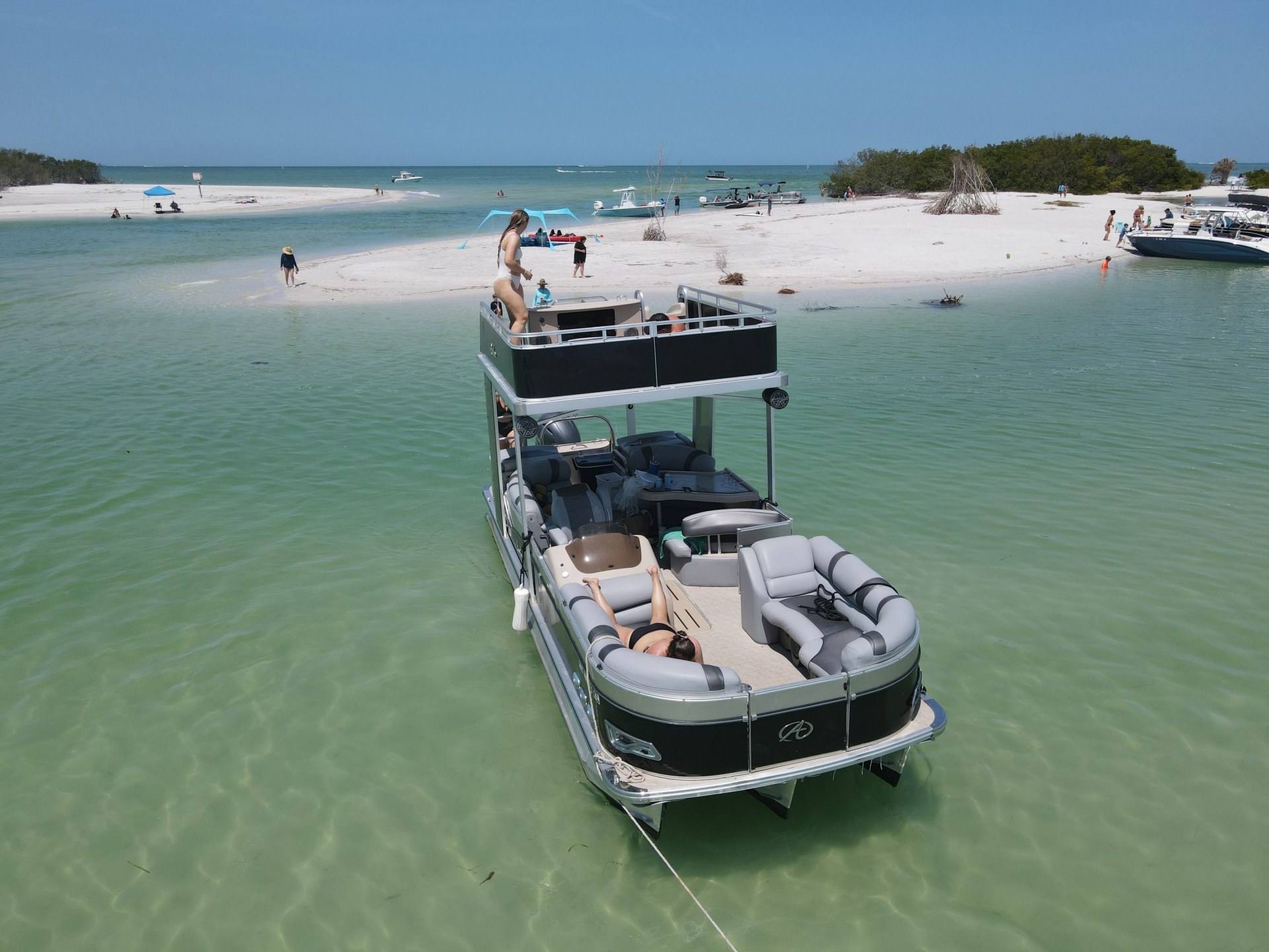 Pontoon anchored at a pristine barrier island